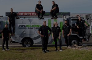 pipe relining solutions truck with pipe relining solutions team